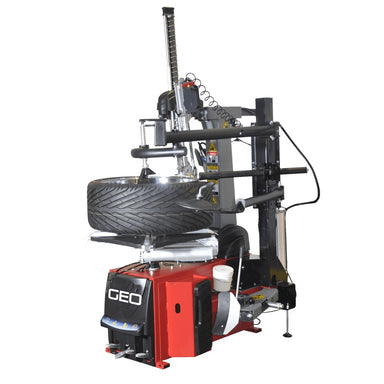 Red amd balck GEO trye changer with a tyre mounted in a tyre changing position on a while background