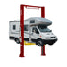 Recreational vehicle on a yellow and red 2 Post 6 ton GEO C6000ES lift, front side view