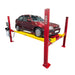 A red GEO four post storage lift with a yellow platform holding a dark red hatchback car, shown on a plain white background.