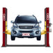 GEO 4000kg red and yellow 2 post manual lift with a Silver SUV against a white background