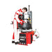 Person working on a tire with a GEO tire changer on a white background
