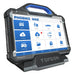 TOPDON Phoenix Max left angle view on docking stand showing home screen with scan, services and quick check functions