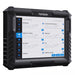 TOPDON Phoenix Remote left side angle view showing upgrade menu with ABS, Adblue and AC system update options